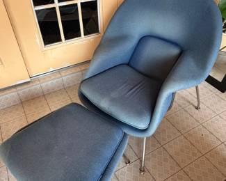 Womb-style lounge chair and ottoman