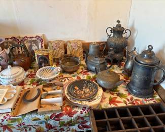 Silver serviceware, collector plates, China