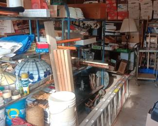 aluminum ladder, blue metal shelving racks on wheels