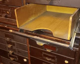 Drawer fronts slide down