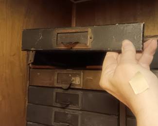 One drawer front needs re-attaching
