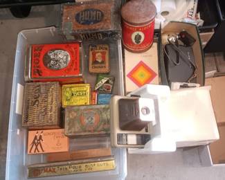 tobacco tins Polaroid cameras