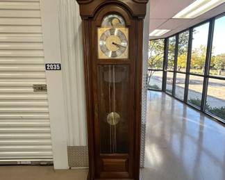 Lot #86 Howard Miller Grandfather Tall Case Clock Moon Phase Dial Brass Chain Driven Cherry Finish