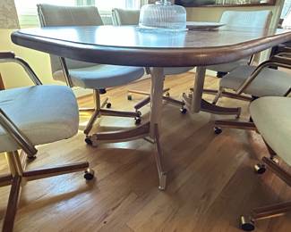 Vintage MidCentury Modern Dining Set with Six Swivel Chairs second image