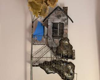 mixed metal wall sculpture