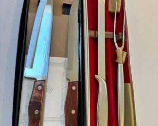 Two Sets Or Boxed Knives
