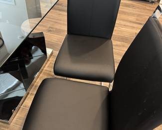 Faux leather and metal chairs