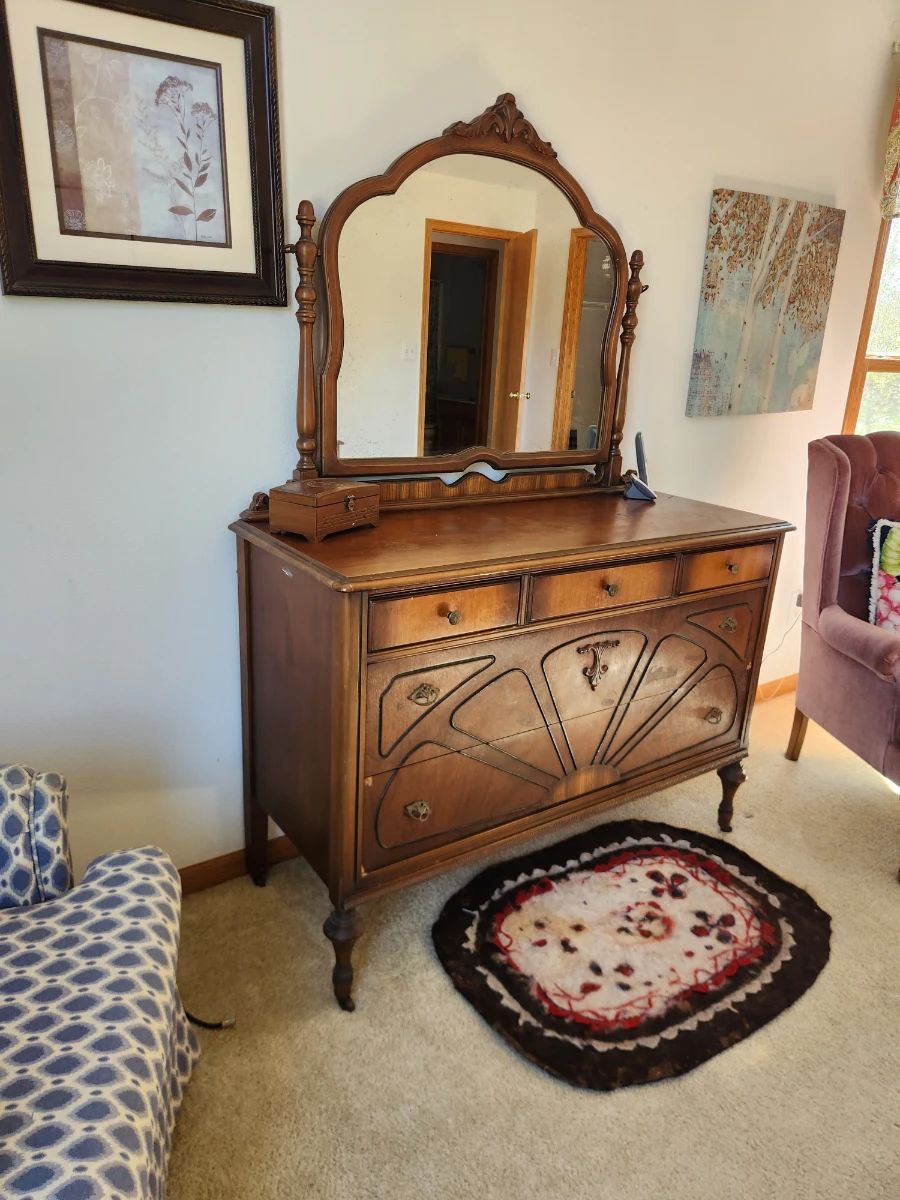Beautiful early 1900's walnut dresser. It has 5 drawers. Dimensions are:  Asking price $400 Willing to entertain offers