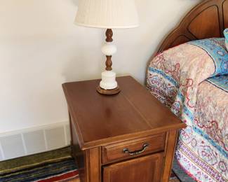 Nightstand with one drawer and one door as well as a magazine rack in the back.   20 w x  27 d x 25 H.  Asking $100. Will entertain offers