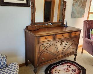 Beautiful early 1900's walnut dresser. It has 5 drawers. Dimensions are: Asking price $400 Willing to entertain offers