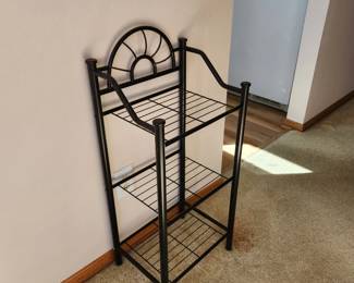 Sunburst metal accent shelf. Dimensions : 16 w x 12 d x 36 h.  Asking  $20. will entertain offers