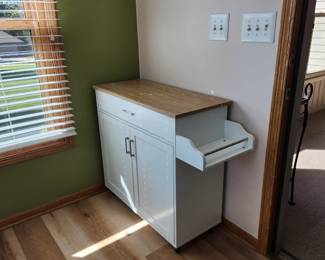 Kitchen Rolling cart.  One drawer and 2 doors with 2 shelves inside. Dimensions : 35.5 w plus a 7.5 overhang x  16 deep  x 28 in high. Asking $100. Will entertain offers 