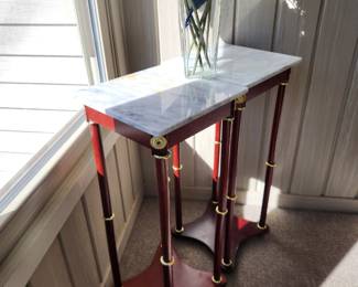 Marble and wood pair of plant stands. Will sell separately or together. Dimensions : 14 d x 14 w x 21.5 h . Asking $30 each or $50 pair. Will entertain offers