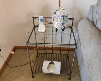Beautiful metal and glass side tables. Pair, can be bought separately. Dimensions: 20 w x  27 in h x 15 in d.  Asking $40 each or $70 pair. Will entertain offers