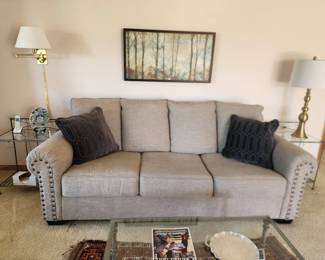 Ashley furniture Zarina Sofa in a heathered gray. Dimensions: 92 w x 38 h x 40 d. Asking  $600. Will entertain offers