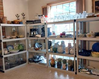 vintage Rival ice machine, bar ware, fondue set, cast iron, clear Pyrex pots, T fal pots, Safe-T-Grip pans, Henware, rolling kitchen island, Pyrex terra covered casserole, bowl and platter, Waterford crystal, Cerutil stoneware, Corning ware covered casserole, Coca Cola slushy maker, Hamilton Beach single serve blenders, vintage GE toasters, Emeril air fryer, Keurig coffee pot, sponge ware, Royal Winton china dessert set, Rosenthal German dish set, Henn stoneware dish set