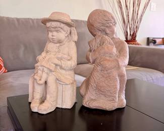 AUSTIN DEE CROWLEY BRIGHT EYES GIRL WITH RAGGEDY ANN DOLL 1984 SCULPTURE SIGNED, and Austin Productions Cement Sculpture of Boy Hugging His Dog by Klara Sever