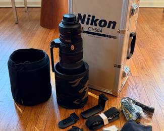 Incredible Nikon AF-S NIKKOR 500mm f/4G ED VR super-telephoto prime lens bundled with its official Nikon aluminum hard case, camo lens cover/coat, tripod foot replacement straps, keys and rear/drop-in filter