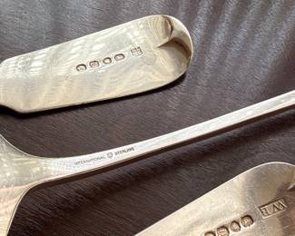 Three large sterling silver serving spoons