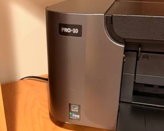 Canon PIXMA PRO-10 printer with a box full of new ink cartridges