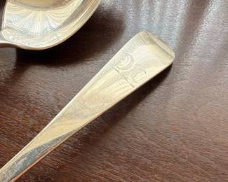 Three large sterling silver serving spoons