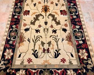 Tufenkian Tibetan carpet hand knotted in the unique Tibetan loopsenneh style, 5’1/2” x 9’