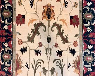 Tufenkian Tibetan carpet hand knotted in the unique Tibetan loopsenneh style, 5’1/2” x 9’