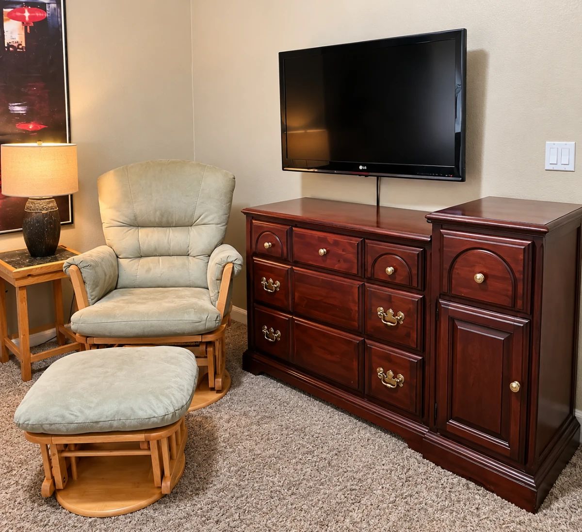 Glider chair with matching ottoman. Solid wood baby changing dresser with diaper storage. Boys room full of all clothes sizes and seasons.