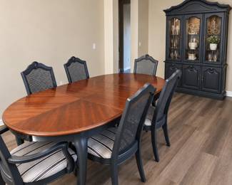 Antique table with leaf and 6 chairs and hutch