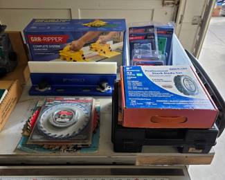 GRR-RIPPER woodworking push-block system with saw blades and shop accessories.