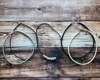 Sleek collar necklaces and cord necklaces in contrasting finishes—versatile fashion jewelry to wear alone or layer with your favorite pieces.