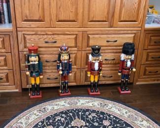 Collection of four vintage painted wooden nutcrackers
