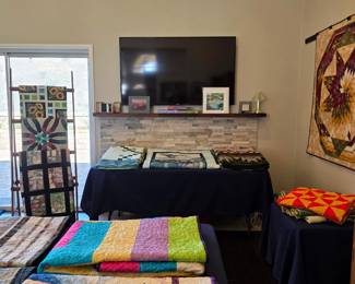 Explore Cathy’s handmade quilt collection, from colorful cuddle quilts and woodland designs to pieced bed quilts and decorative quilted wall hangings.