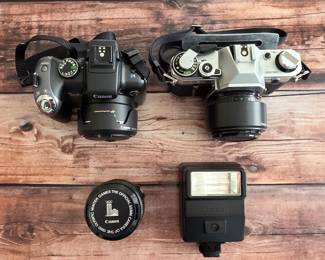 Canon PowerShot SX10 IS digital camera, Canon 35mm film camera and flash.