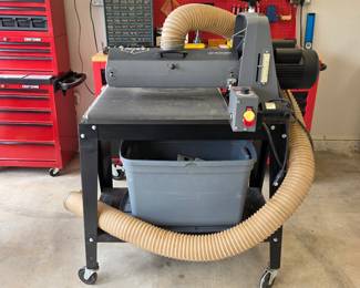 SuperMax 19-38 drum sander on a mobile stand.