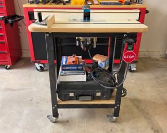 Router table with Rockler router lift, adjustable fence and mobile stand.