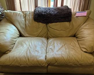 Beige leather liveseat