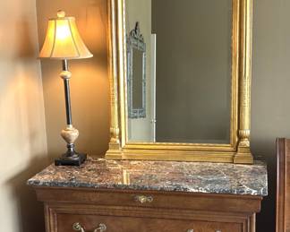Pair of Henredon Chest with beautiful gold mirror and lamp.