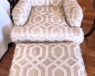 Upholstered chair and ottoman.