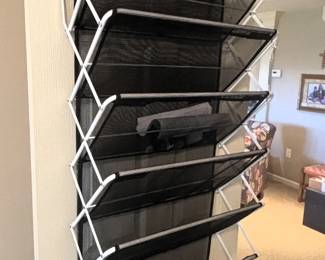 Door hanging shoe caddy.