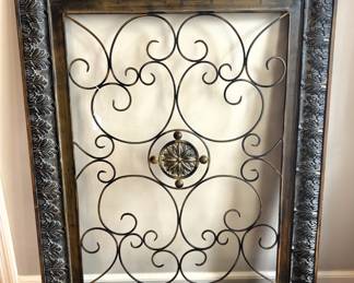 Framed wire wall hanging.