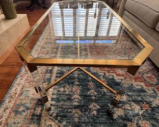 BUY IT NOW! $150.00. Glass top brass coffee table.  24" W x 18" H x 48" L.  Call Jan at 314 960-5700.