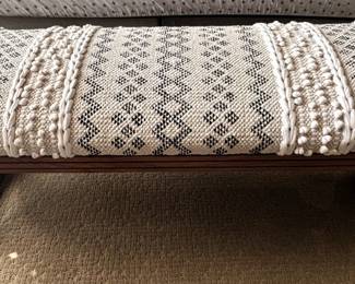 Upholstered bench.