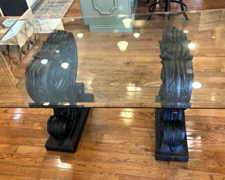 BUY IT NOW! $350.00. Thick glass top table w/beautiful base.  Call Jan at 314 960-5700.