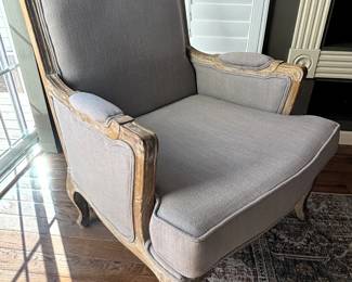 Upholstered arm chair.
