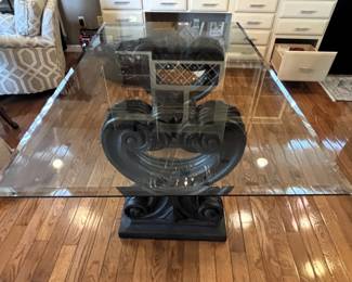 BUY IT NOW! $350.00. Thick glass top table w/beautiful base.  Call Jan at 314 960-5700.