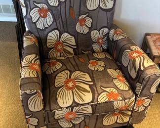 Floral upholstered chair.