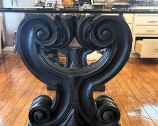 BUY IT NOW! $350.00. Thick glass top table w/beautiful base.  Call Jan at 314 960-5700.