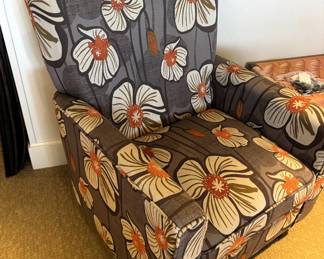Floral upholstered chair.