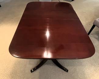 BUY IT NOW! $175.00. Mahogany dining table w/one leaf & custom pads. 38" W x 56" L (68" L w/Leaf) x 29 1/2" H. Call Jan at 314 960-5700.